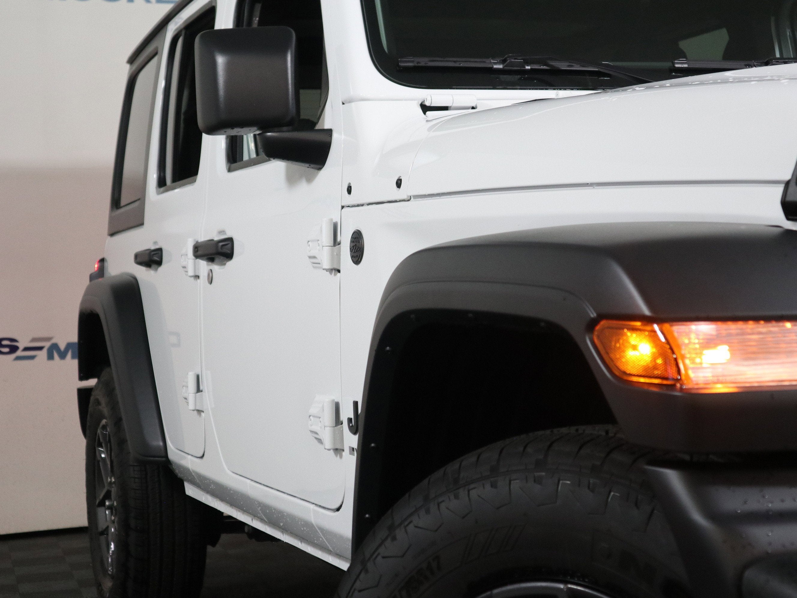 2026 Jeep Wrangler — rear three-quarter view